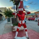 Red and white Selk'nam spirit statue