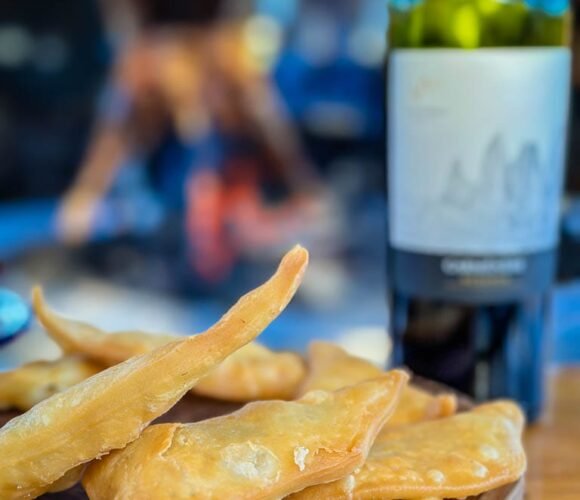 Fried dough served with red wine
