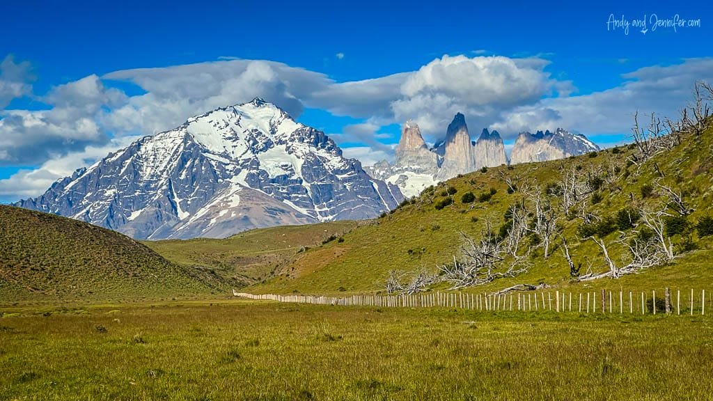 Snow-capped Torres del Paine mountains under blue sky