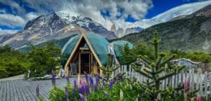 Welcome dome entrance at eco-camp with mountain backdrop