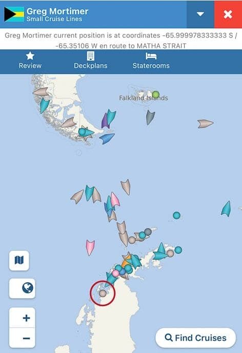 Screenshot of a cruise tracking map from CruiseMapper.com showing the location of the Greg Mortimer ship at the far end of the Antarctic peninsula