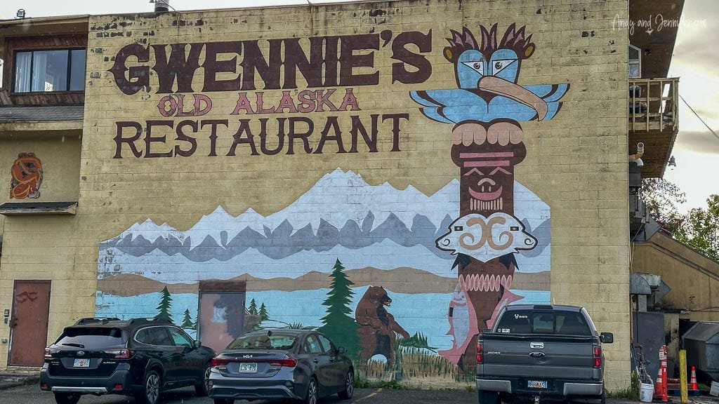 Gwennie's Old Alaska Restaurant mural with mountains and totem pole