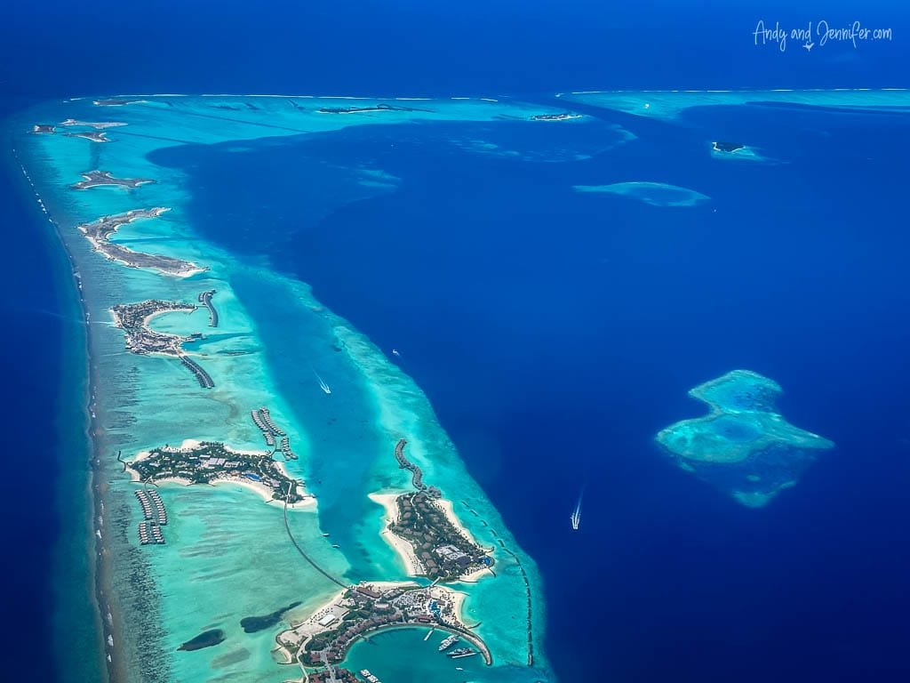 Aerial view of Maldives islands and turquoise waters.