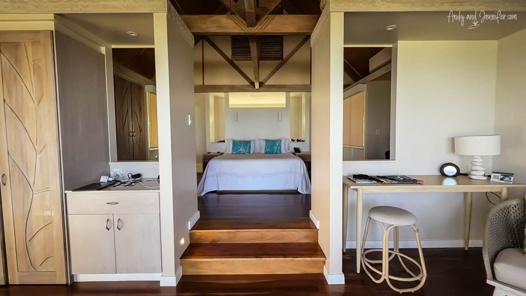 Elegant and serene interior of a beachfront bungalow at the Little Polynesian Resort.