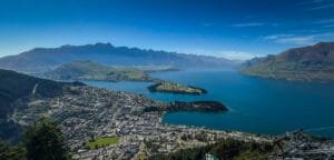 Scenic aerial view of Queenstown with lake and mountain backdrop