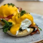 Eggs Benedict with spinach and hollandaise sauce
