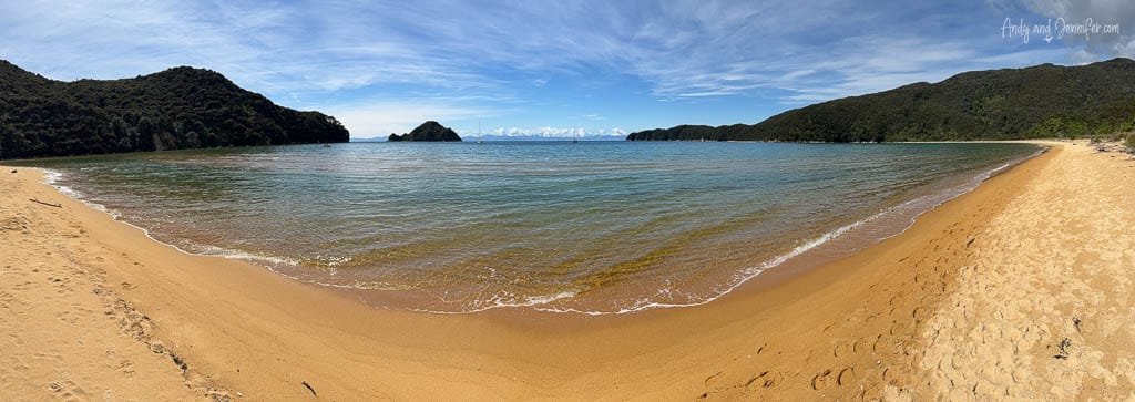 Secluded golden beach with calm turquoise sea