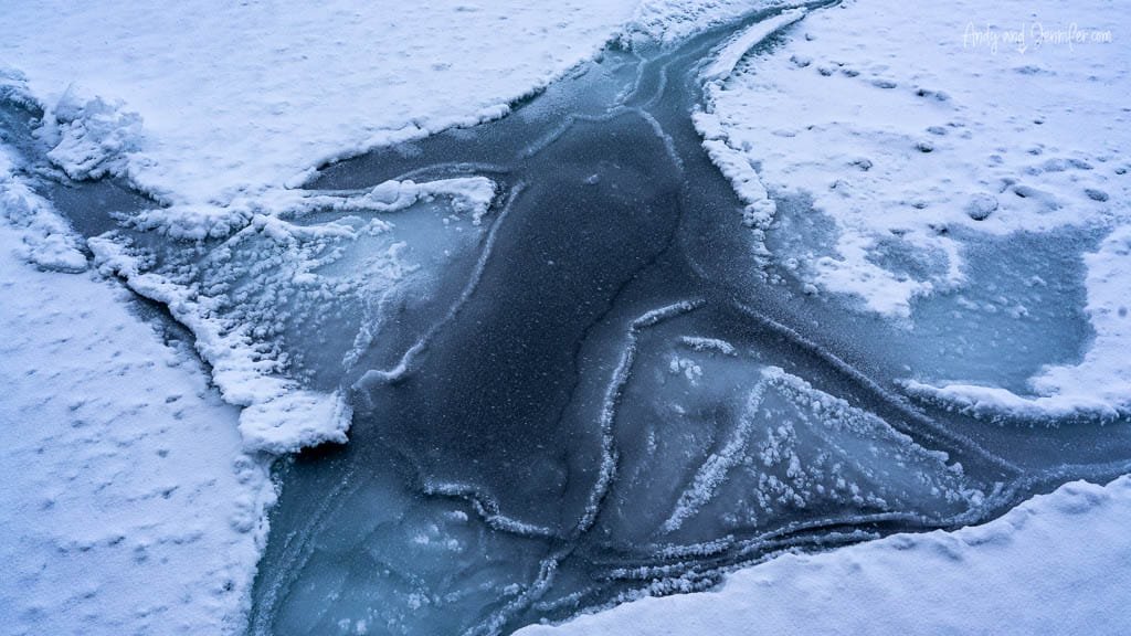 Cracked Arctic sea ice with textured snow edges