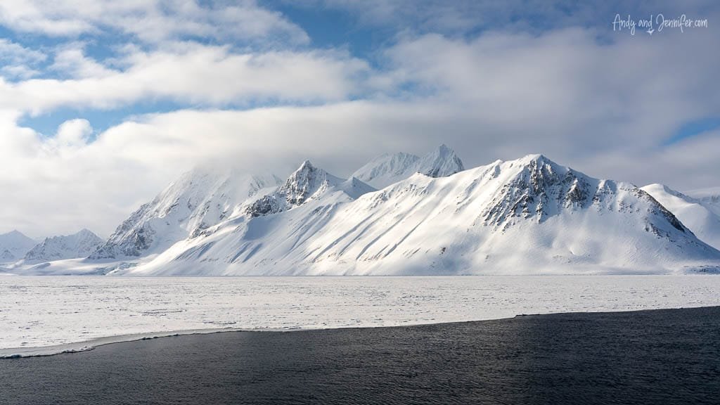 Icy coastline with Arctic mountain range