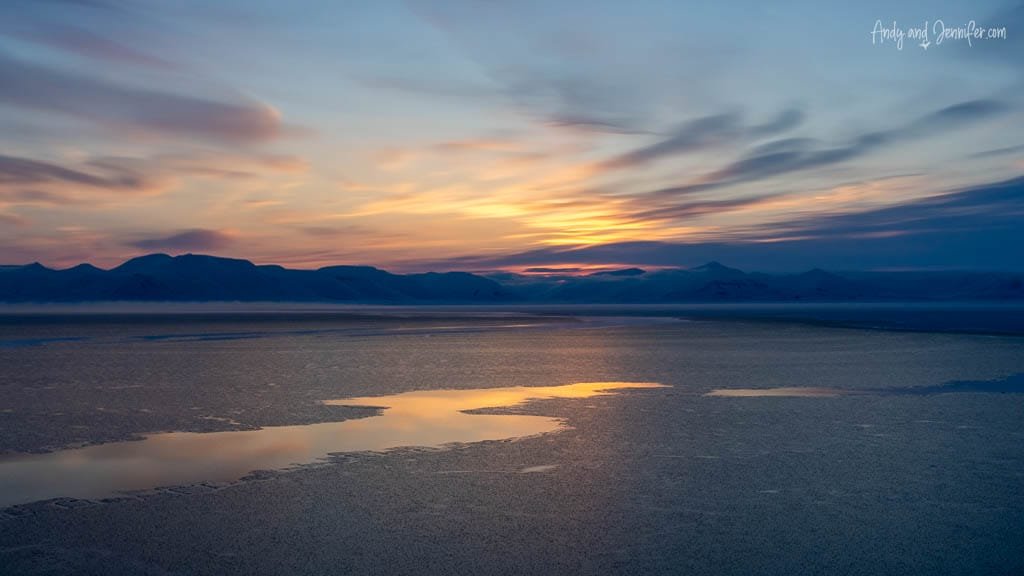 Golden light over drifting sea ice floes