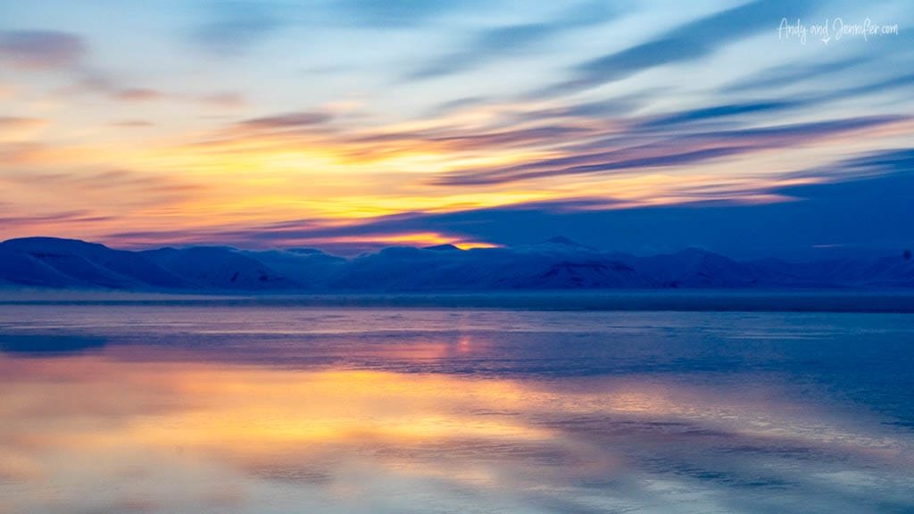 Pastel sky and mountain reflections