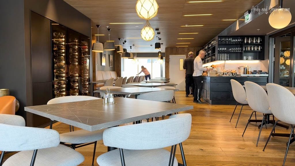 Modern Nordic restaurant with wood floors and pendant lights