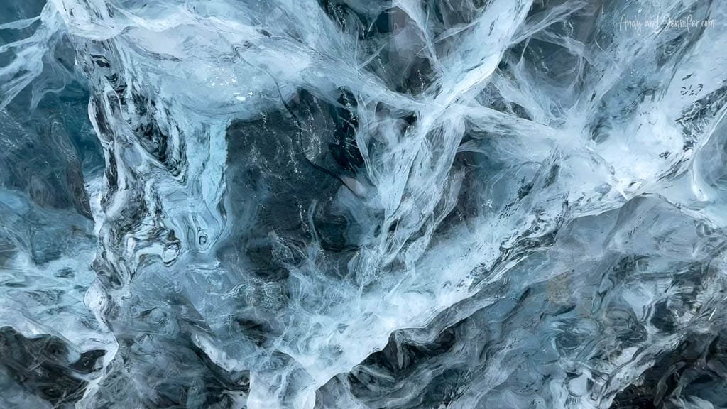 Close-up of textured blue glacier ice wall