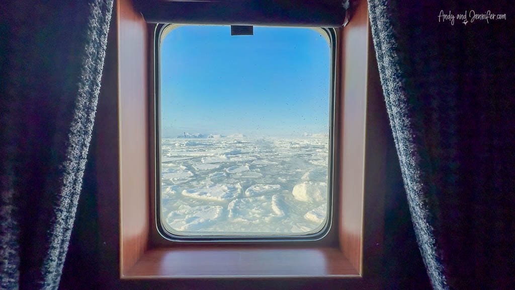 Sea ice view through ship cabin window