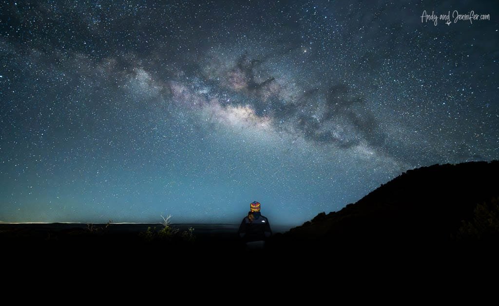 Stargazer under vivid Milky Way stars