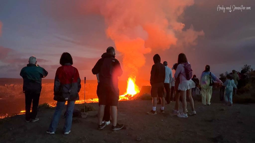 Crowd watching nighttime lava eruption at Kīlauea