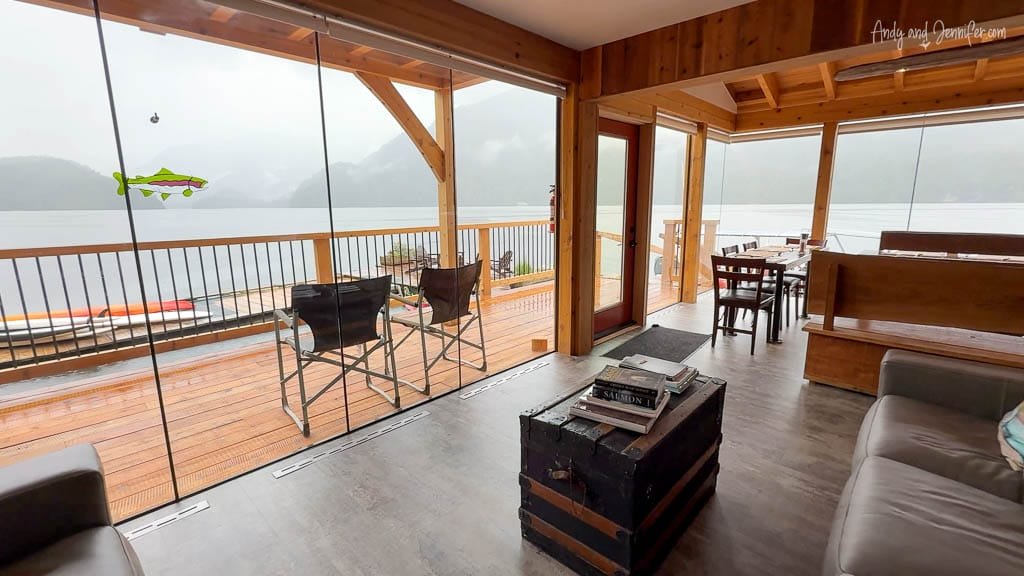 Lodge interior with lake and mountain views