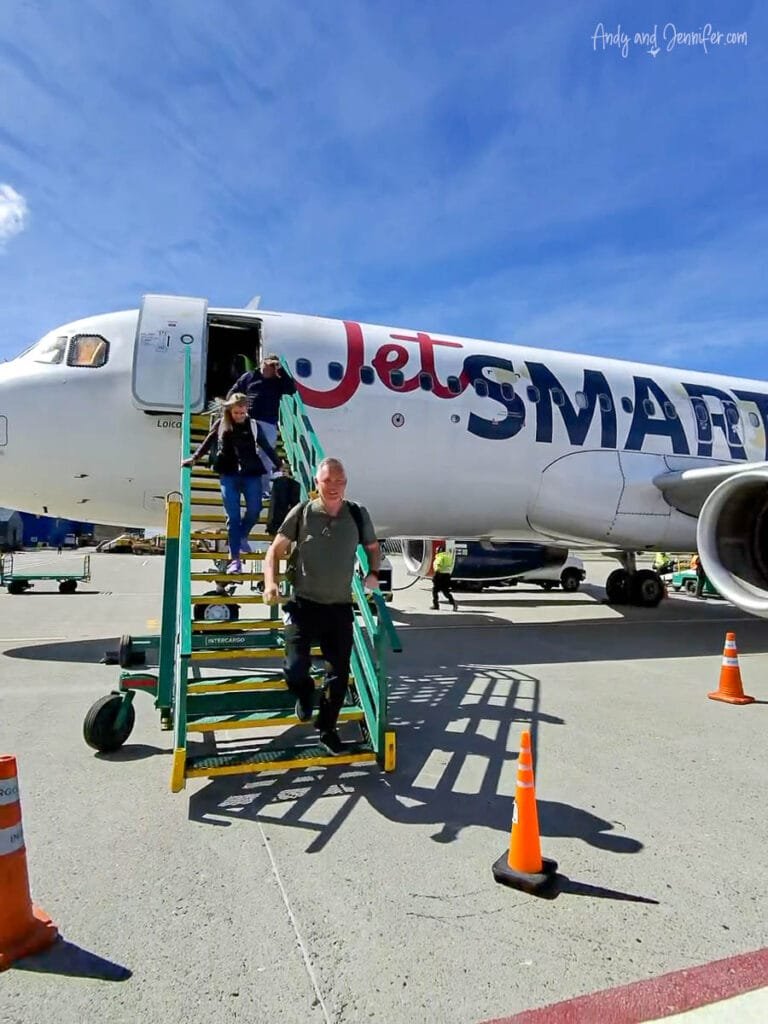 Passengers disembarking JetSmart charter flight in Ushuaia for Antarctica expedition