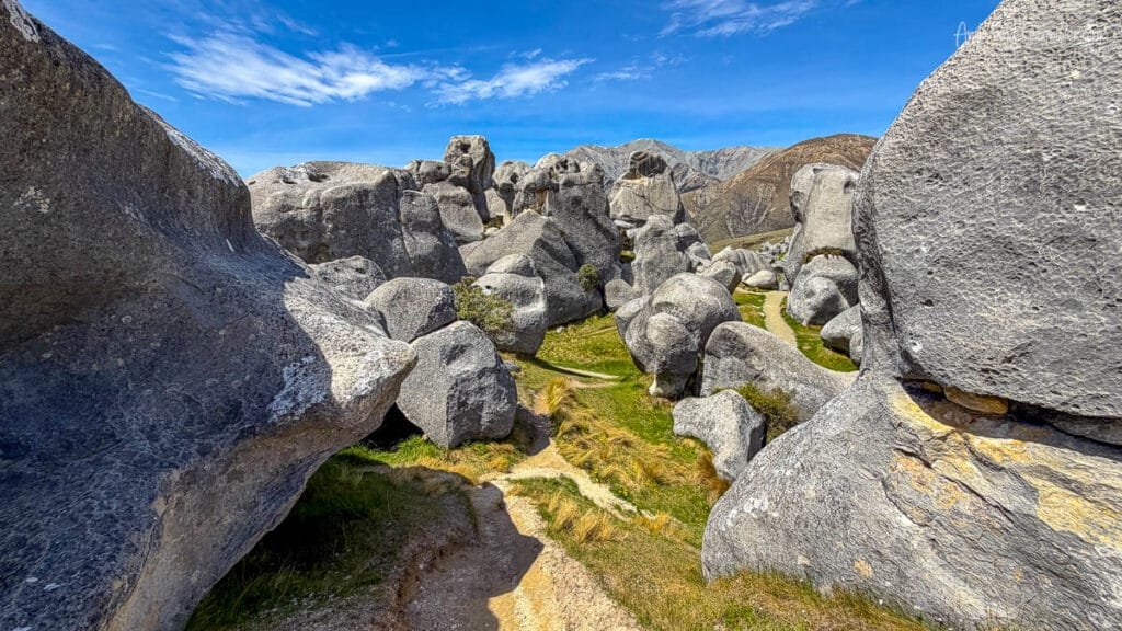 Walking path winding through limestone rock formations at Castle Hill Rocks