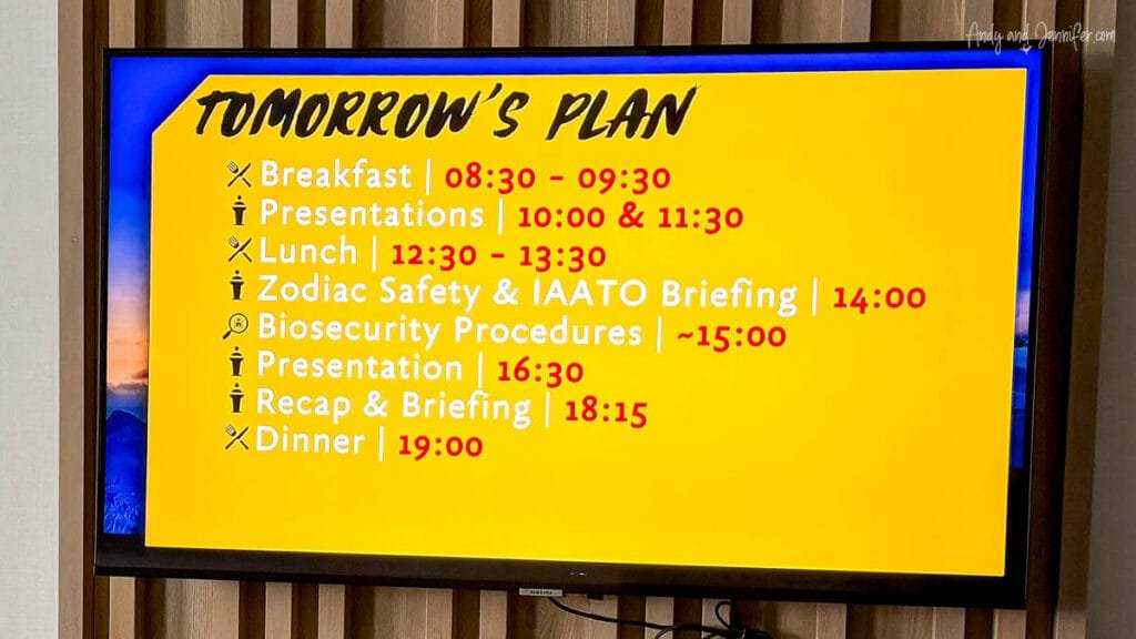 Daily schedule board showing Antarctica expedition plans for the next day
