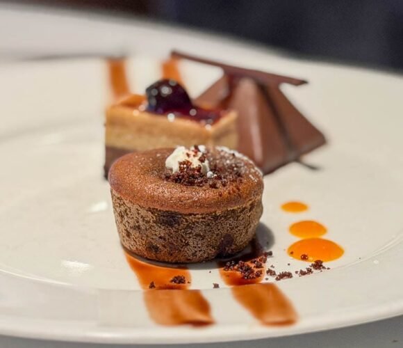 Chocolate lava cake and assorted desserts served aboard the Ultramarine during an Antarctica expedition cruise