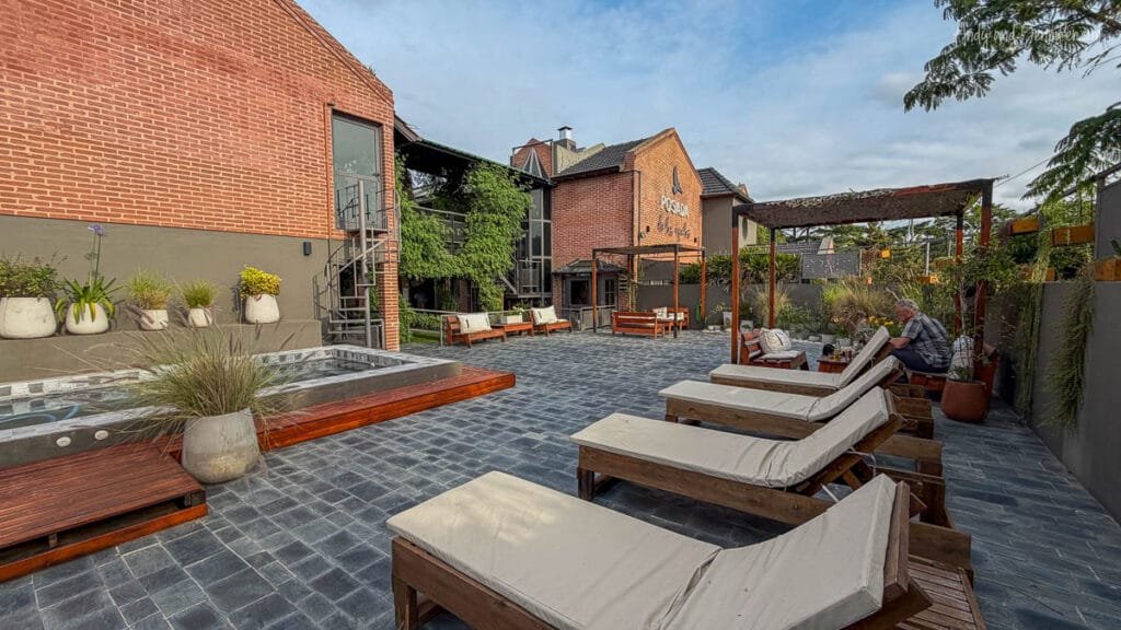 Courtyard and outdoor lounge area at a guesthouse near Ezeiza International Airport in Buenos Aires, Argentina, before an international flight home after an Antarctica expedition cruise