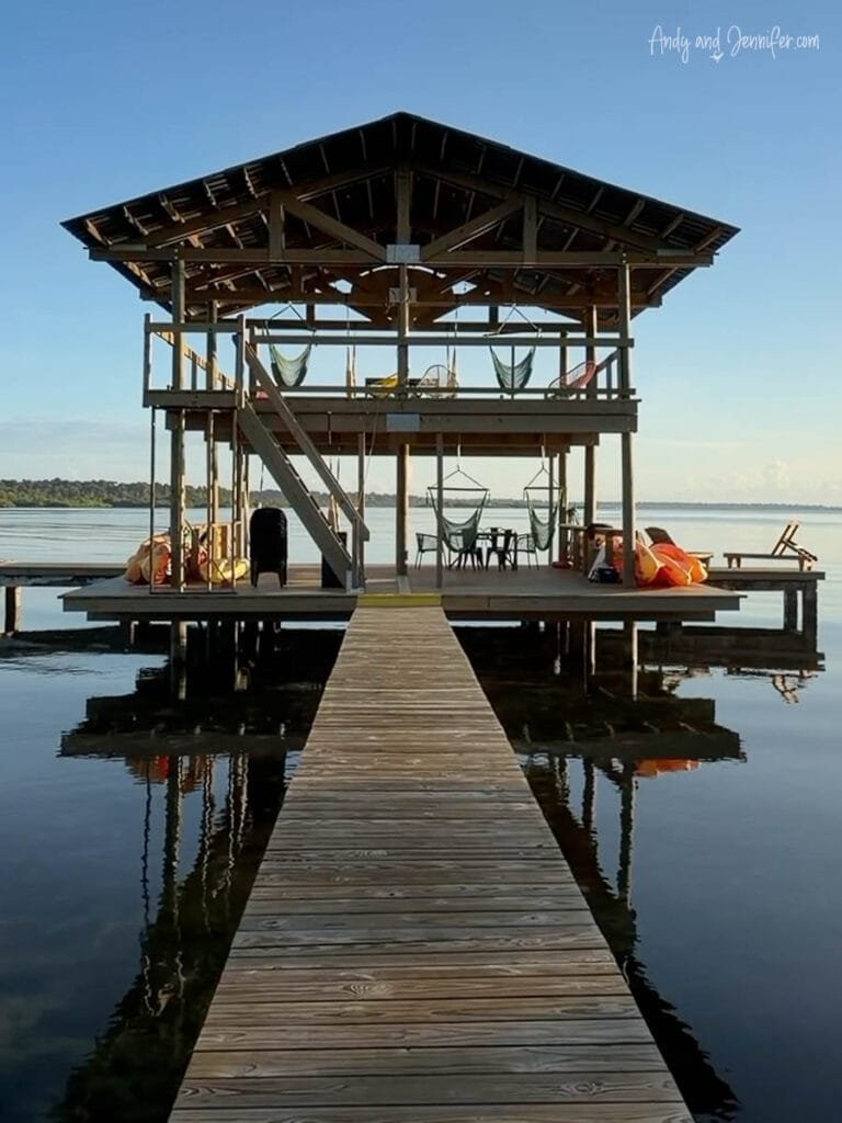 Overwater relaxation deck with hammocks and kayaks at Tranquilo Bay Lodge in the Bocas del Toro archipelago of Panama.