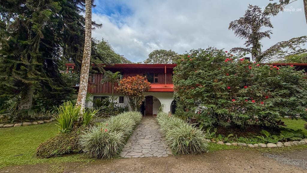 Main lodge building surrounded by tropical gardens at Rancho Naturalista in Costa Rica.
