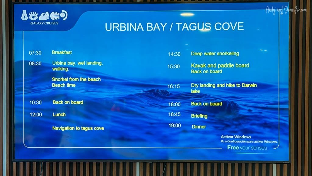 Daily activity schedule for Urbina Bay and Tagus Cove displayed aboard the Ecogalaxy during a Galápagos Islands cruise.