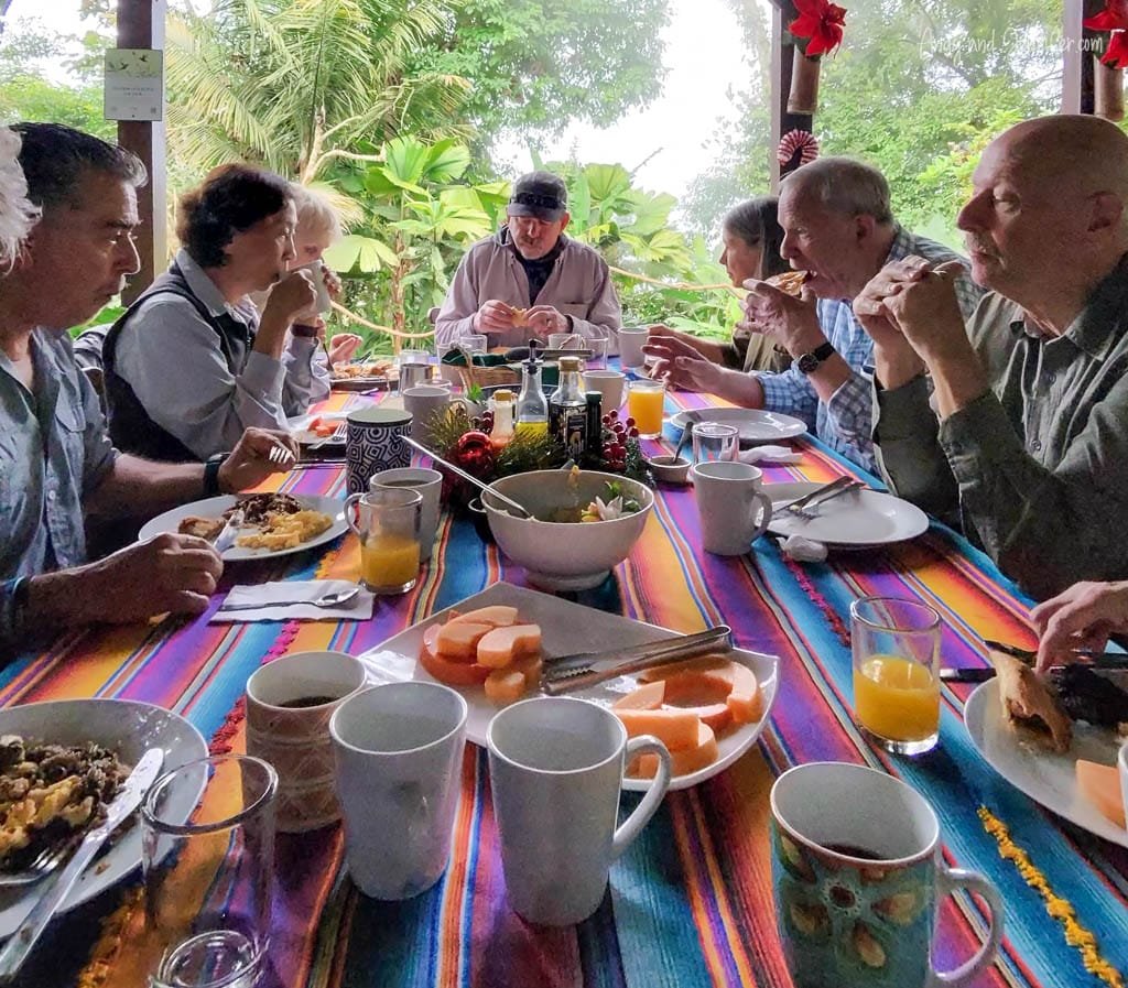 Guests eating a family-style breakfast in the open-air dining room at Rancho Naturalista, Costa Rica.