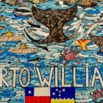 Mosaic artwork featuring penguins, marine wildlife and the words “Puerto Williams” in Puerto Williams, Chile.