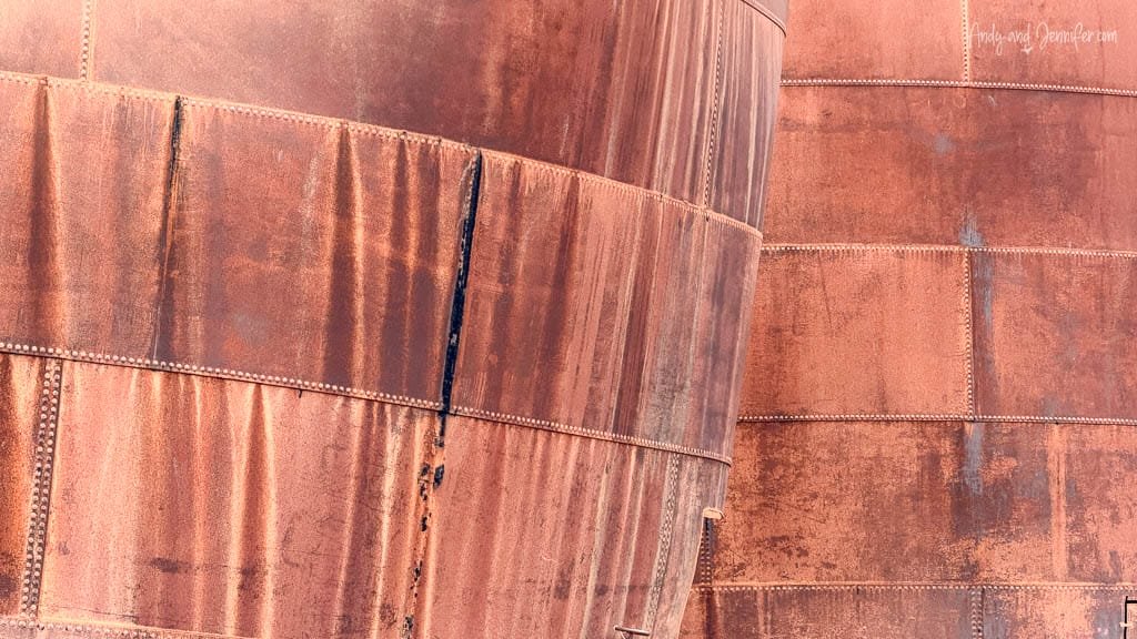 Rusted metal storage tanks from the former whaling station at Grytviken, South Georgia.