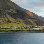 Edinburgh of the Seven Seas settlement beneath the steep volcanic slopes of Tristan da Cunha, viewed from the sea.