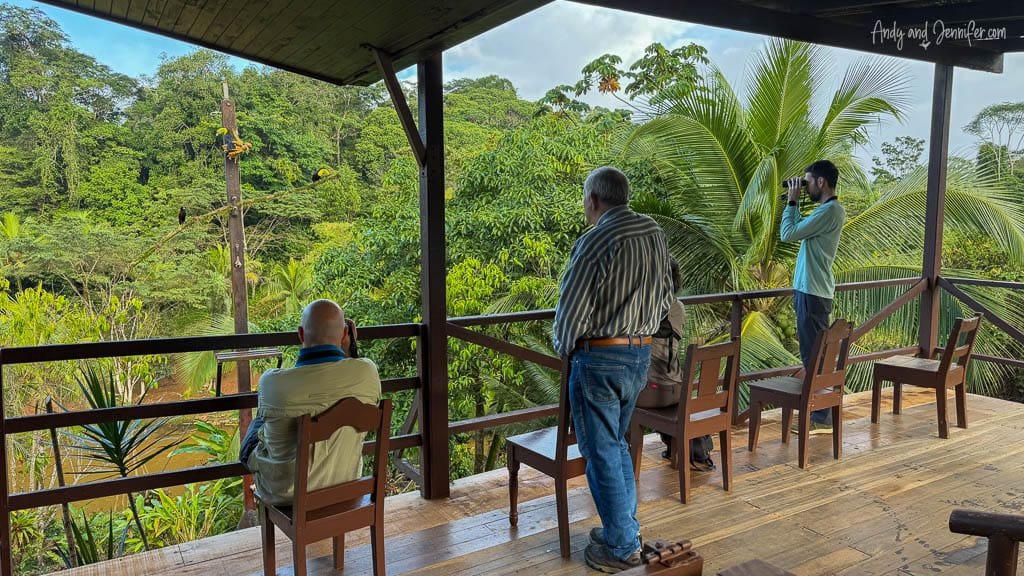 Bird photographers watching the feeders from the open-air restaurant at Laguna Lagarto in Costa Rica.