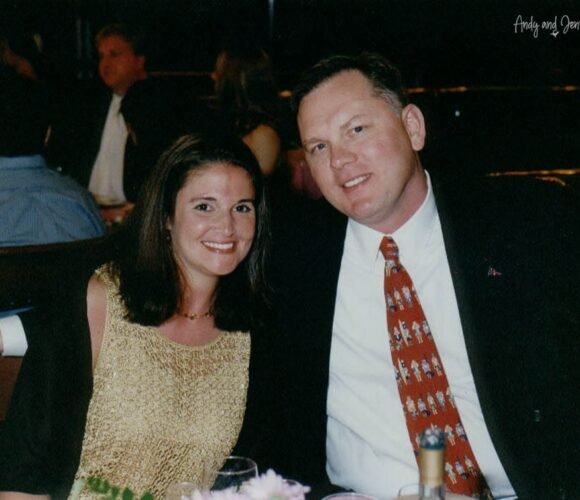 Andy and Jennifer posing for a photo at dinner on a cruise in 2001